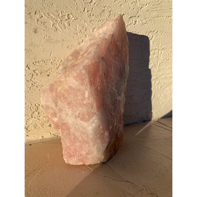 Huge raw Rose Quartz stone weighting 40lb. This beautiful crystal stone will make a lovely accent for a home or office...