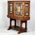 A fine mahogany display cabinet, circa 1900, likely a transitional piece with influences from the earlier Aesthetic...