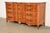 A beautiful French Provincial Louis XV style twelve-drawer triple dresser or chest of drawers By Kent Coffey USA, Circa...