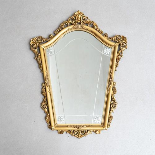 Embrace the timeless elegance of this 20th century French antique gold cornucopia mirror, a stunning piece that will add a...
