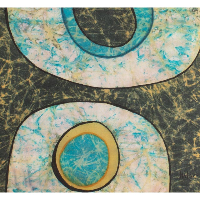 An abstract batik by the American artist Harry Hilson (1935-2004). Signed to the lower right corner, this work features an...