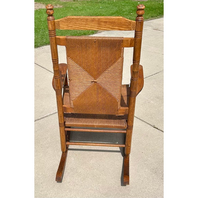 Extra Large Adult, Rush-Woven Seat and Backrest, Solid Oak, Turned Legs and Spindles, Wide Arm Rests, 1960’s, For Sale - Image 4 of 6