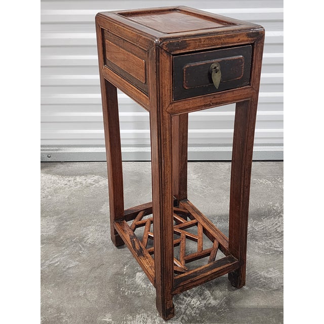 This Chinese flower stand dates from the 19th century and is made from red elm (zelkova), known in China as 'jumu' or...