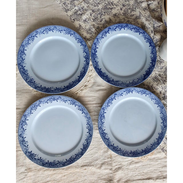 Ten antique dinner plates from the Mimosa service produced by U&C Sarreguemines circa 1920. Made of fine blue earthenware,...