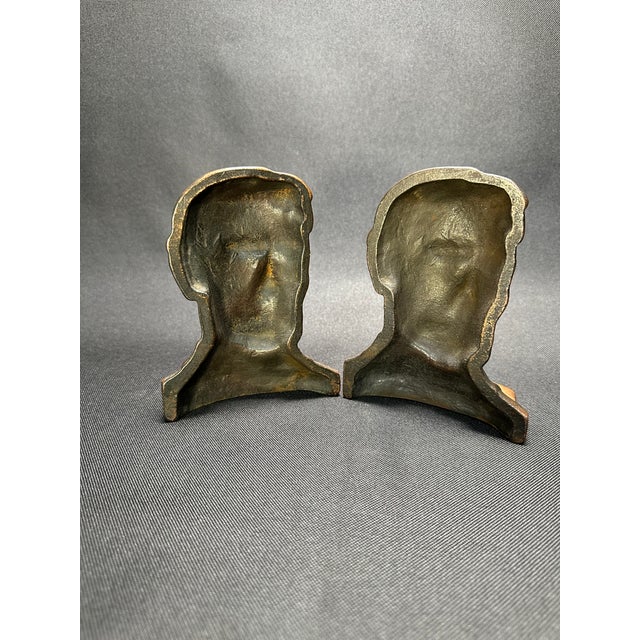 A vintage pair of solid cast iron bookends produced in the early 20th century. Abraham Lincoln in a somber gaze. These...