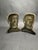 A vintage pair of solid cast iron bookends produced in the early 20th century. Abraham Lincoln in a somber gaze. These...