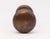 Plain round bronze door knob set with a dark antique patina. The manufacturer is unknown. Priced as two door knobs, two...