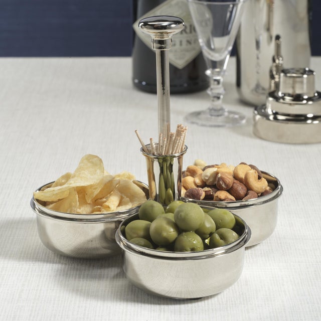 A sleek and sophisticated serving solution, this Basso Condiment Trio features three integrated condiment dishes crafted...