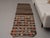 Vintage Hand-Knotted runner rug is a semi-antique vintage kilim runner rug. The '70s Eastern region of Anatolia's unique...