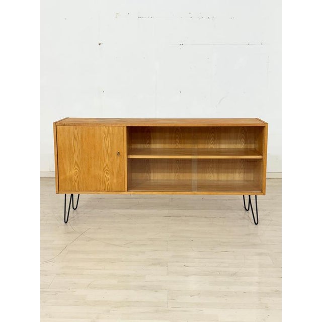 For sale is this versatile mid-century sideboard from the renowned Series 602 by Deutsche Werkstätten Hellerau, designed...