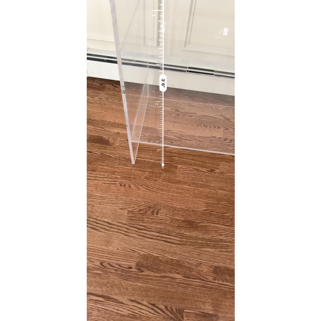 Vintage lucite cabinet with 2 shelves each with a cutout for wires etc, I assume it was for electronics etc and the top...