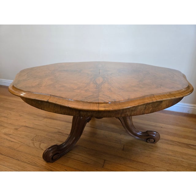 This is a striking Victorian walnut burl loo or card table. It measures approximately 42 inches across and is 20 inches...