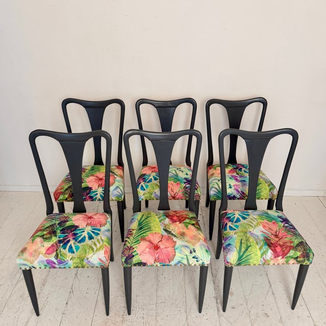 This elegant set of six Italian dining chairs was made in Italy in the 1940s and is designed in the style of Osvaldo...