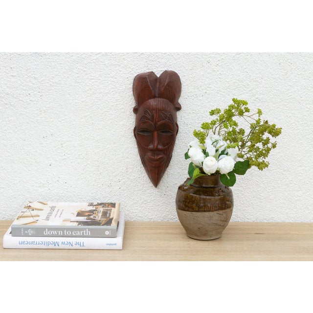 This charming Kwele mask from Gabon or the Republic of Congo is a delightful example of African tribal art. The mask is...