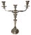 An elegant pair of French mid-20th century silver candelabras, finely executed in the Neoclassical tradition with graceful...