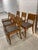 An exceptional and rare set of eight (6) mid-century dining chairs, expertly crafted in Denmark circa 1960. These chairs...