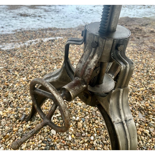Add that unexpected element to your home with this impressive, substantial accent table. Steampunk at its best. Unmarked...