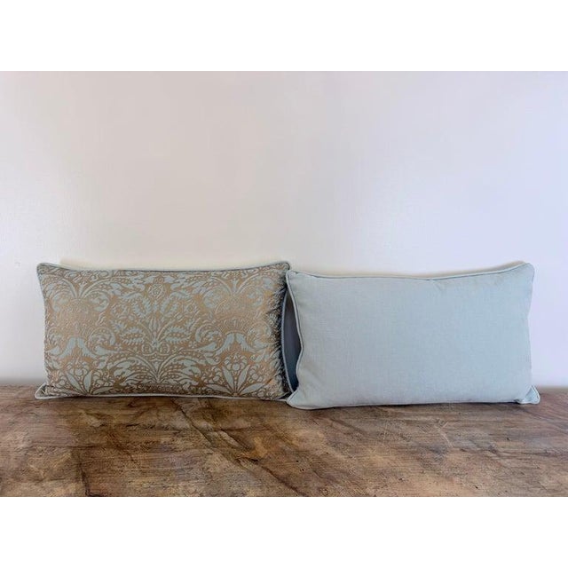 A sophisticated pair of custom lumbar pillows rendered in an authentic Mariano Fortuny printed cotton. The large-scale...