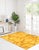 This hand knotted pile runner features a vibrant color palette consisting of yellow, gold, and orange tones. Crafted from...