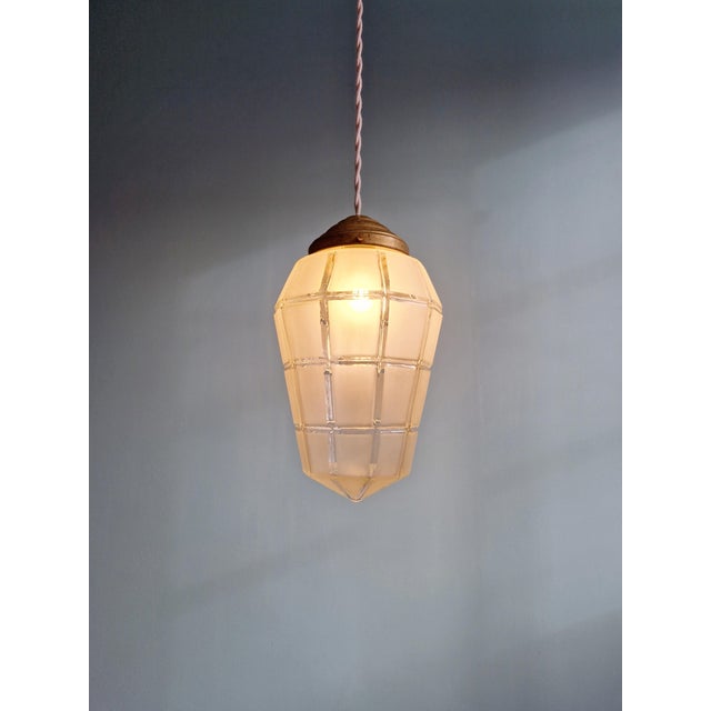 Art deco pendant light in faceted satin glass, 1920s-30s. the suspension has been re-electrified and is compatible with an...