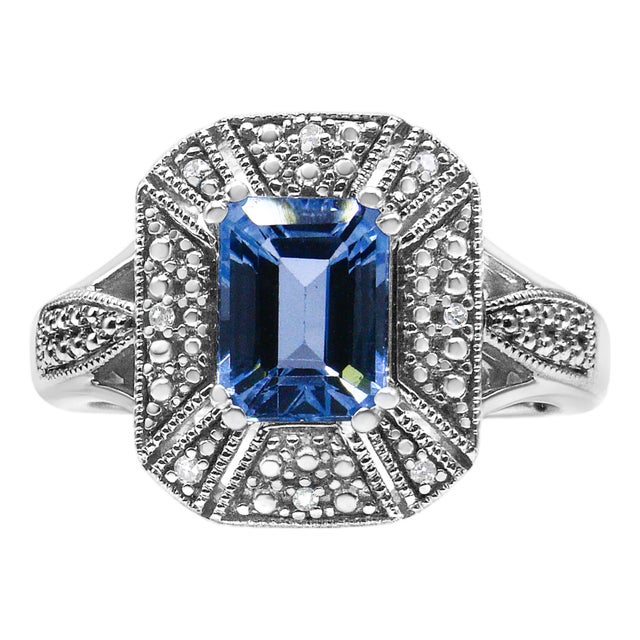 .925 Sterling Silver Diamond Accent and 8X6 mm Emerald-Shape Blue Topaz Ring (I-J Color, I2-I3 Clarity), Size 6.5 For Sale