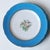 Six 19th-century Vieux Paris porcelain dessert plates / Scalloped edges / Blue rim, central floral design and gilt border...