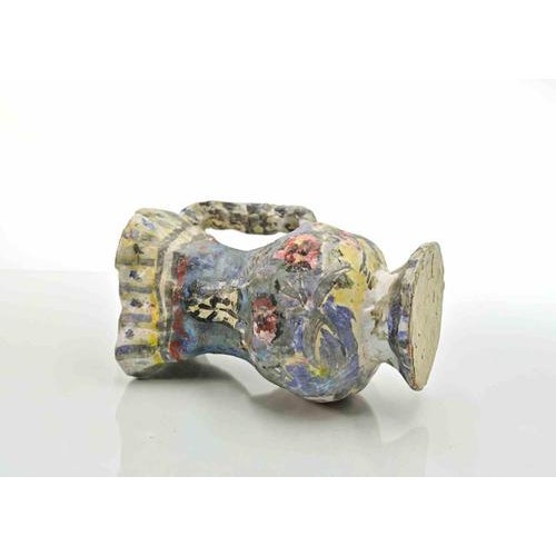 Painted Terracotta sculture realized by Sirio Pellegrini in 1960s. Good condition. This piece is attributed to the...