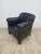 A very comfortable club armchair in the Art Deco style. A large and very comfortable armchair with excellent seating...