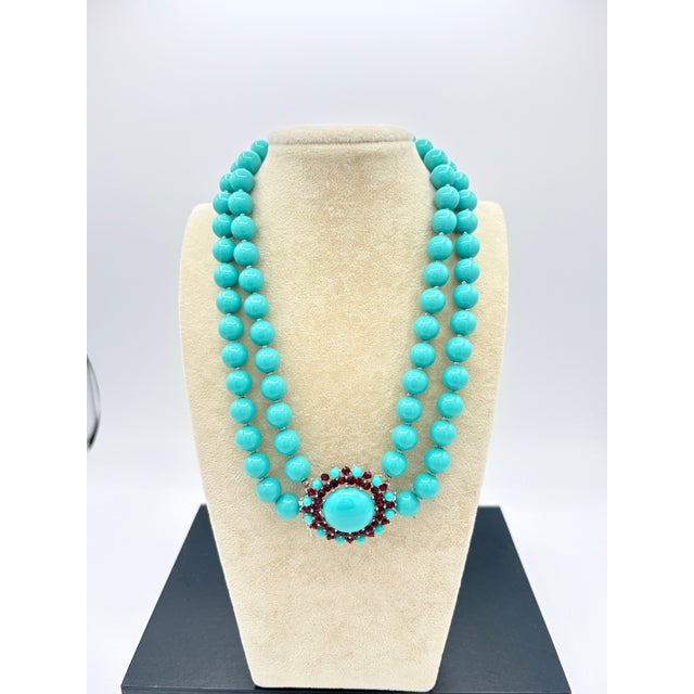 A rare Crown Trifari mid‑century suite featuring its original double‑strand molded turquoise beads with the Crown‑T...
