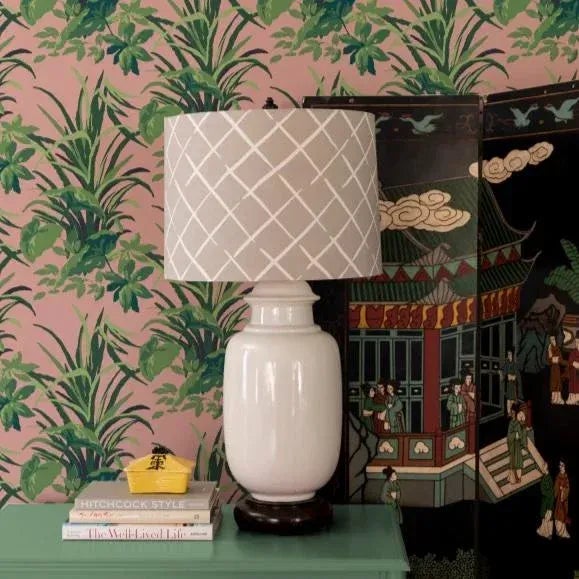 A sample of our Jungle Road Bahama Pink Wallpaper Care Instructions: Wipe with damp cloth.