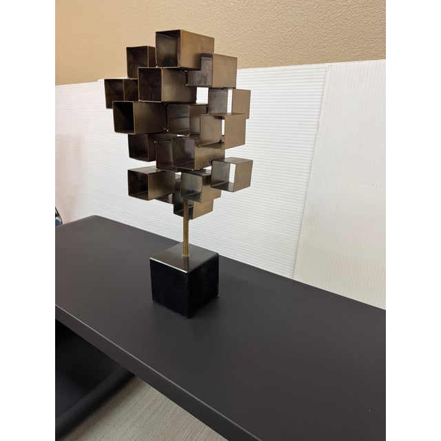 Design Plus Gallery presents the Edan Brutalist Sculpture from Arteriors Home. This is a striking decorative accent...