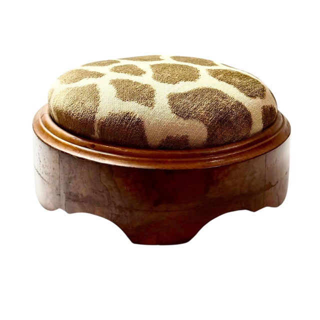 A handsome English footstool crafted in richly figured burled walnut, dating to the late 19th century, circa 1890s. The...