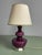 A striking Belgian mid-century table lamp featuring a sculptural, mouth-blown opaline glass base in a rich, deep purple...