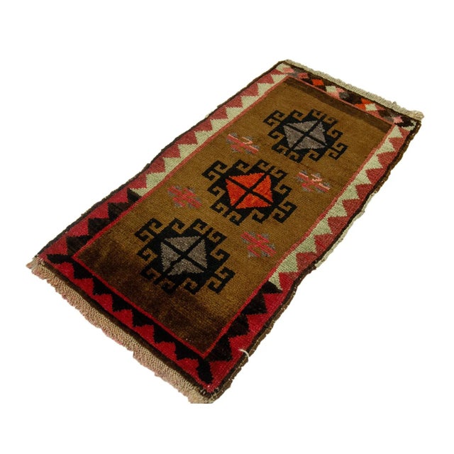 Vintage Handknotted decorative mini rug from Kars region of Turkey. Approximately 45-55 years old. In very good condition.