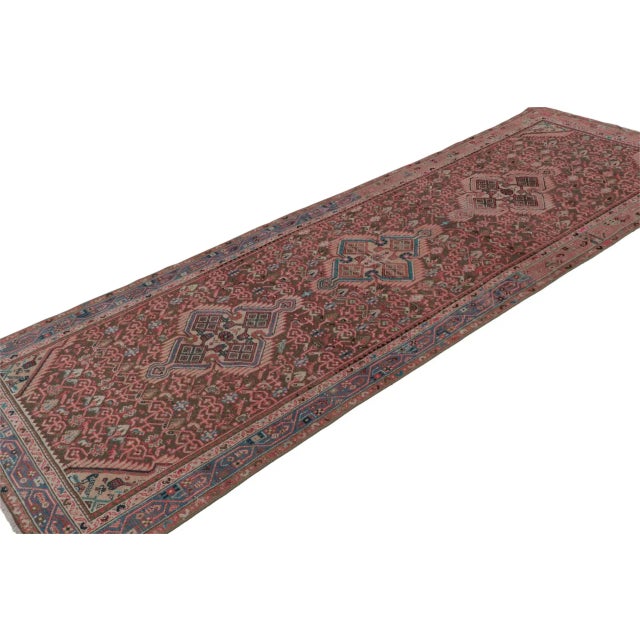 Hand knotted in wool, a 4x10 Persian rug circa 1970-1980 - latest to join Rug & Kilim’s vintage selections. On the Design:...