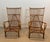 This very beautiful and unusual pair of designer armchairs is made of rattan. This is a French work. Circa 1950