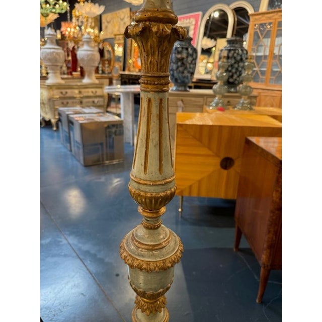 The 19th Century French Louis XVI Carved and Parcel Gilt Floor Lamp is a stunning piece of antique home decor. This floor...