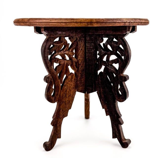 Lovely little stand made of solid hand carved sandalwood. This piece breaks down into two pieces; the top is a separate...