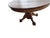 Antique American quarter-sawn oak dining table featuring a substantial pedestal base terminating in carved claw feet. The...