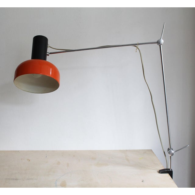 An exceptional adjustable clamp-mounted desk lamp produced by NAPAKO in Czechoslovakia during the 1970s. The construction...