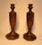 Deeply grained wood in a satin medium toned walnut finish encompasses this pair of solid oak wood candlesticks. Believed...