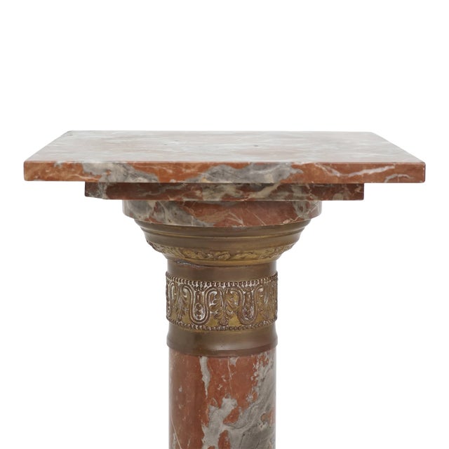 - 37.75"h, 9.75"sq - Rouge marble, bronze - Pedestal top can rotate - Condition: Excellent; one very small chip to edge of...