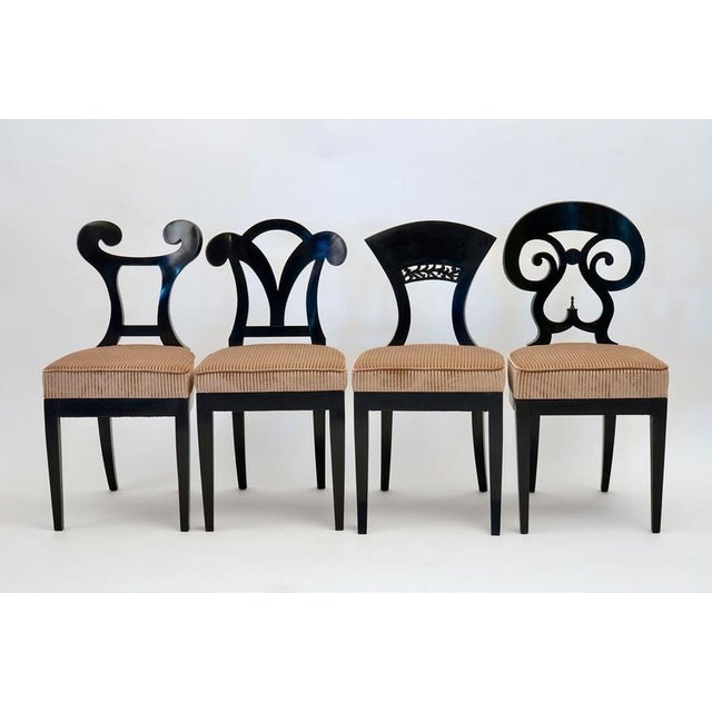 The Eclectica collection is a group of Biedermeier chairs offered in various way. Here offered in a selected set of 8...