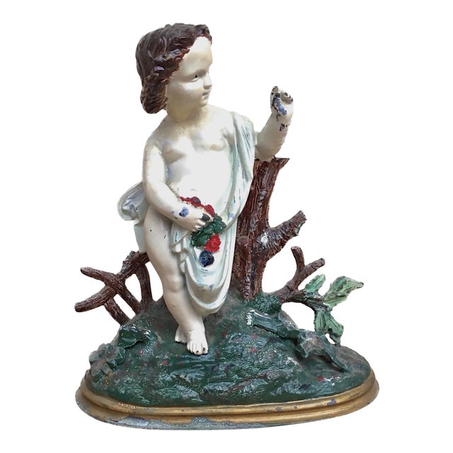 Antique Painted Cast Iron Cherub With Flowers For Sale