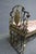 An Oscar Bach attributed gilt bronze and wrought iron bench featuring an upholstered seat with decorative scrolling...