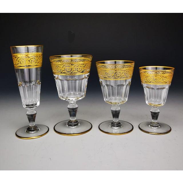 A rare and elegant Baccarat Eldorado crystal glassware service, produced circa 1968, comprising a complete 32-piece set...