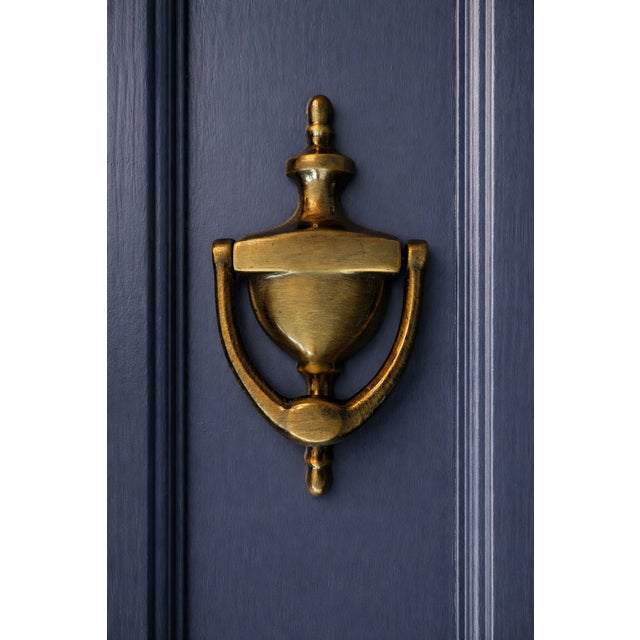 Add timeless elegance to your entryway with this traditional bronze door knocker. Featuring a classic Georgian-inspired...