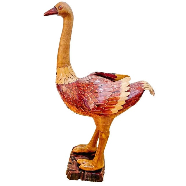 A whimsical standing ostrich bird skillfully hand-crafted of wicker rattan and bamboo and coated with a nice shine...