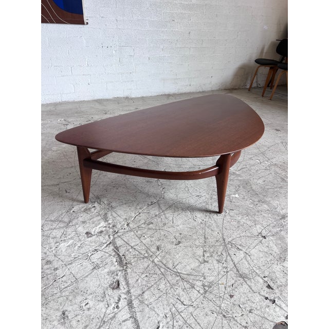 Newly refinished Brown Saltman walnut boomerang coffee table with generous proportions, gorgeous wood grain and...