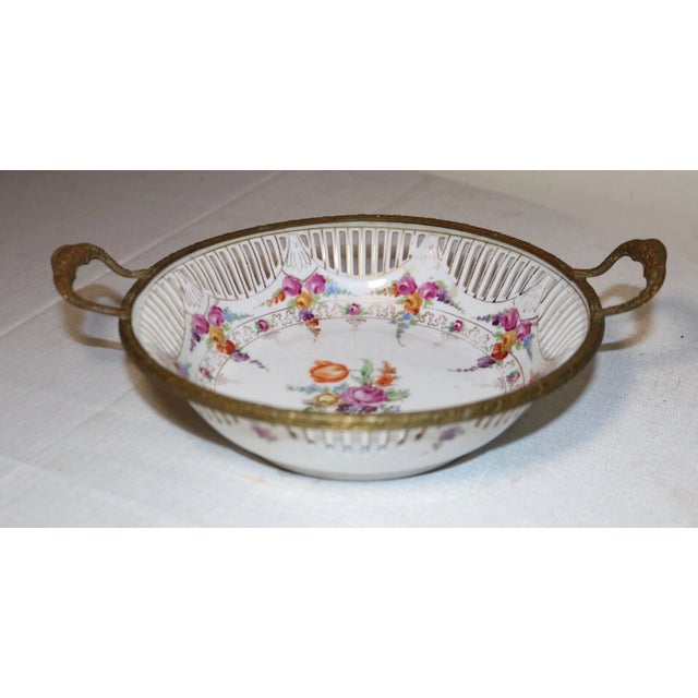 Up for sale is a very nice quality antique bronze mounted porcelain Schumann Bavaria bowl. It's made of a white...